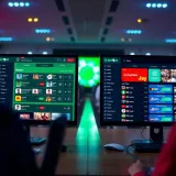 Comparison of sports betting platforms showing features and options on digital screens